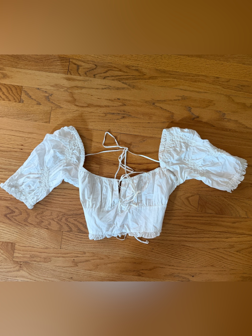 Fitted crop peasant top with open back